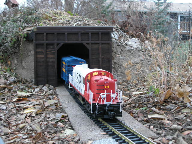 [Emerging from the tunnel]