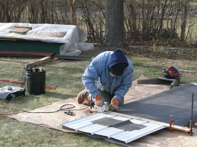 [Cutting steel roofing]